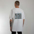 weißes oversized "Stoff hoch 4" Raver T-Shirt von hinten, getragen von einem Mann